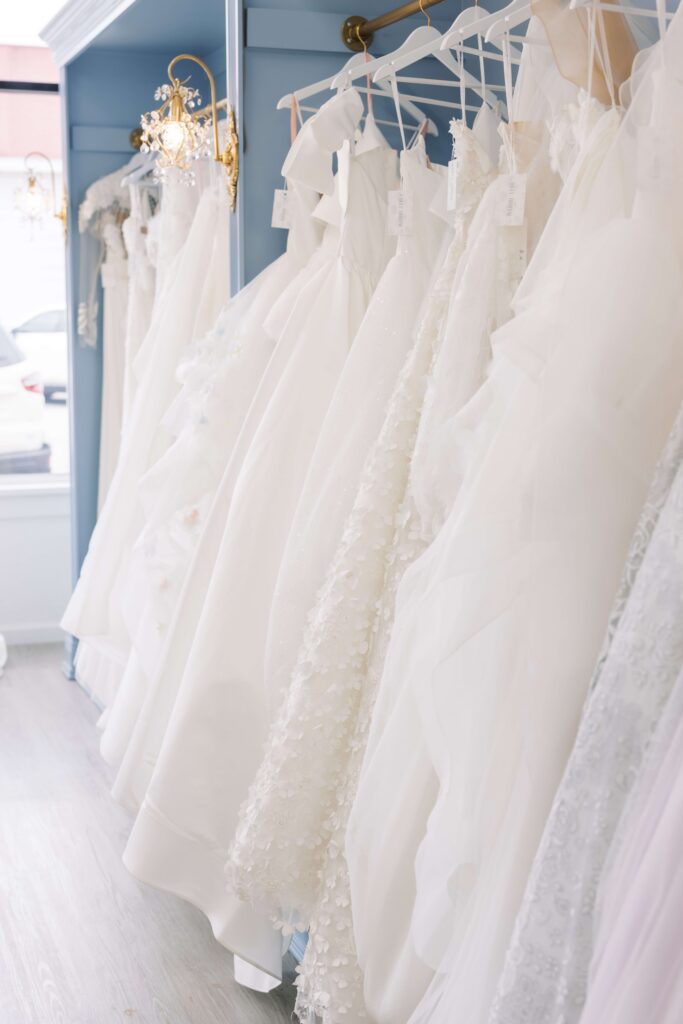 racks full of off-the-rack wedding dresses at Bleu Bridal Co in Bixby, Oklahoma